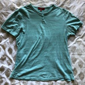 A turquoise men’s shirt